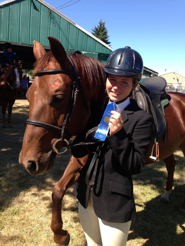 Jasmine received blue ribbons in Western Dressage and all three of her trail classes